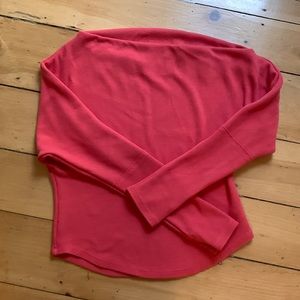 A fun coral colored free people (waffle) top! Sized medium.